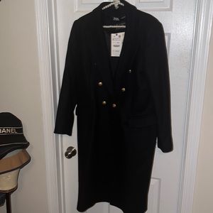 Full black wool trench w/ gold hardware. BRAND NEW!IN SEASON NO WEARS! NO TEARS!